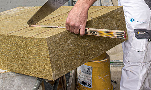 A house with two balconies overlooking a scenic view.